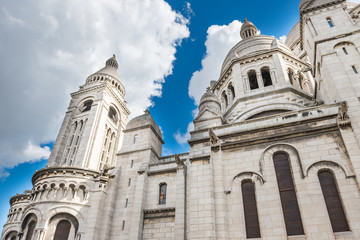 Fototapeta na wymiar Basilica of the Sacred Heart of Paris or Basilica Coeur Sacre on Montmartre in Paris, France