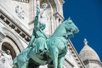 Statue on Basilica of the Sacred Heart of Paris or Basilica Coeur Sacre on Montmartre in Paris