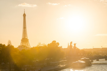 Beautiful sunset with Eiffel Tower and Seine river in Paris, France