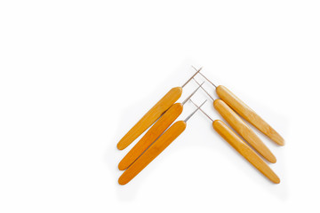 Wooden knitting hooks. Yellow wooden handls comfortable  for knitting . Iron hook a