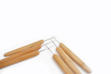 Wooden knitting hooks. Yellow wooden handls comfortable  for knitting . Iron hook a