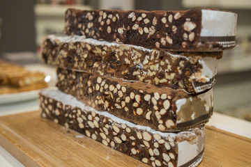 Typical Italian Festive Cakes one over the other: Panforte from Tuscany