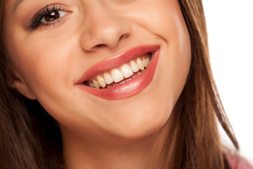 Smiling woman with natural and healthy teeth