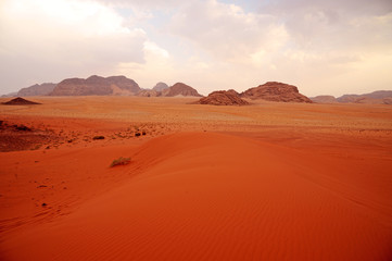 Fototapeta na wymiar panoramic view of wadi rum desert lookin like mars planet with rocks and red sand