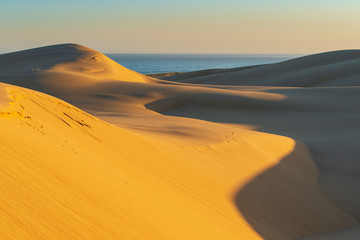Fototapeta na wymiar Sunset at Stockton Sand Dunes, Australia. 