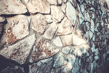 Close up of natural stone wall. Stone wall texture 