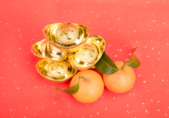 Chinese gold ingot mean symbols of wealth and prosperity.Chinese calligraphy Translation:good bless for money