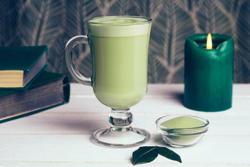 Vegan coconut matcha latte. Powdered green tea latte