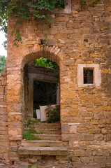 Fototapeta na wymiar An old doorway in the historic hill village of Oprtalj in Istria, Croatia 