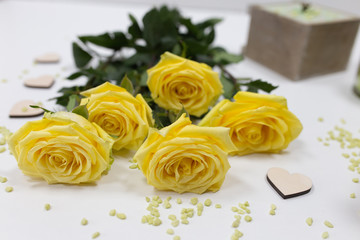 Yellow roses on a light table