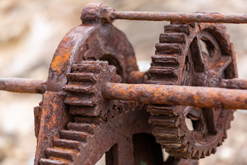 The rusted cogs and gears of a historic boat winch used on the Fleurieu Peninsula at Second Valley South Australia taken on 1st November 2018