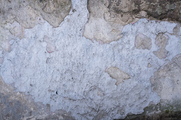 Fragment of gray grunge concrete wall.