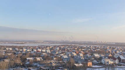 view over houses under snow
