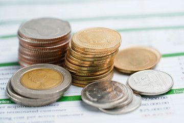 Saving stack coins Thai bath money on white background. Finance, Account, Statistics, Analytic research data economy, Stock exchange trading and Business company meeting concept