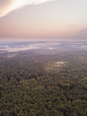 Fototapeta premium Beautiful misty evening landscape photographed from drone