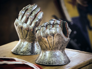 Closeup of antique steel gloves