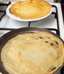 Pancakes from dough fried in a pan