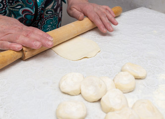 Fototapeta na wymiar Cooking dough on the table at home
