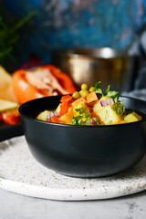 A bowl of delicious Italian vegetable soup Minestrone. Selective focus.