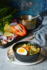 A bowl of delicious Italian vegetable soup Minestrone. Selective focus.
