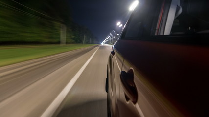 Drivelapse from Side of Car moving on a night highway timelapse hyperlapse