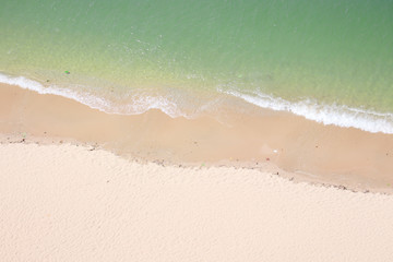 Top view background of beautiful tropical turquoise sea sand beach on outdoor summer holiday season.