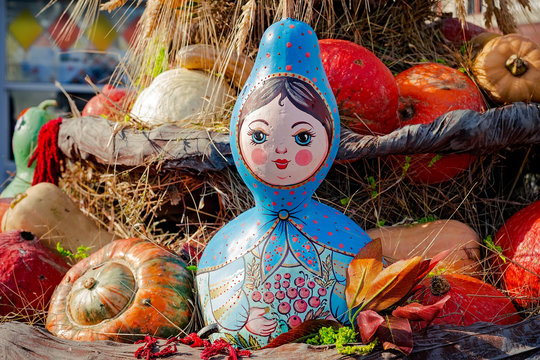 Autumn  composition with pumpkinspkin in various shapes, flowers and plants  on Manege square in Moscow, Russia. Harvest holiday, farm market.  Autumn farm decorations, Background for halloween.  