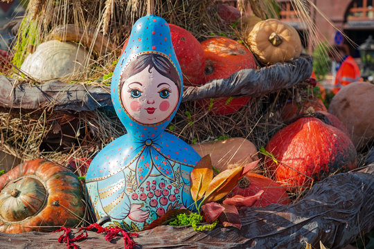 Autumn  composition with pumpkinspkin in various shapes, flowers and plants  on Manege square in Moscow, Russia. Harvest holiday, farm market.  Autumn farm decorations, Background for halloween.  