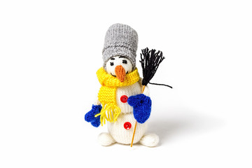 Snowman. Knitted handmade toys. Amigurumi. Hand made.