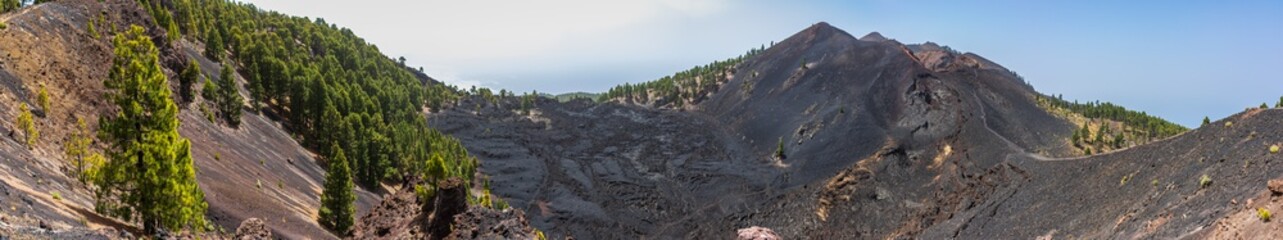 Panoramic view of the edge of a volcanic crater. High resolution.