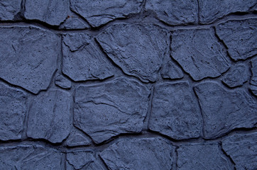 Gray cold stone texture from a building stone