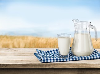 A glass of milk and a milk