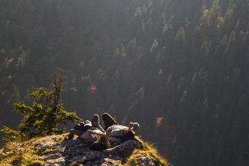 Couple laying on a mountain top