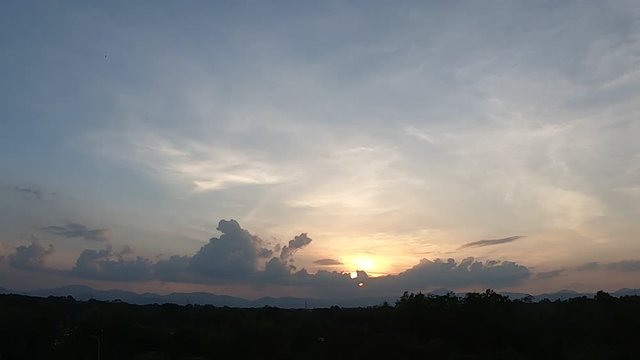 Time lapse View Mountain sunset In tropical countries 