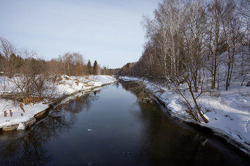 Beautiful winter landscape with river and snow. Sunny frosty day