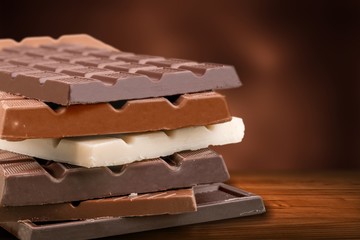 Delicious chocolates isolated on  background