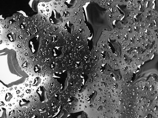 Water drops on the black surface