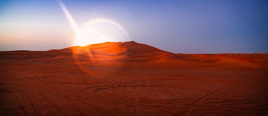 Desert at sunset. Sand dune in the desert.