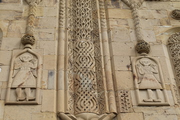 Bas-reliefs on facade of Ananuri church in Georgia