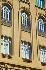 Fototapeta premium Old building facade with windows.