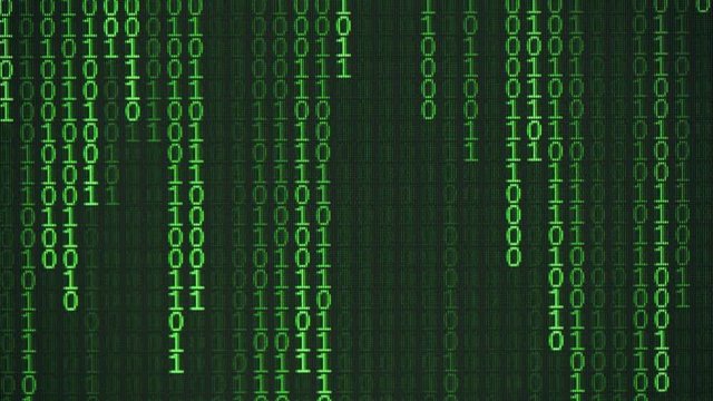 Green binary code on a computer monitor.