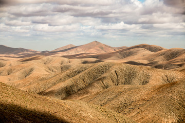 Fototapeta na wymiar Dry mountain view at Fuerteventura, Spain