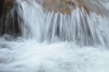 water run through river pass rock and stone in forest