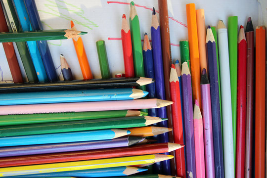 Arranged colored pencils close up