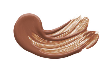 Light beige makeup smear of creamy foundation