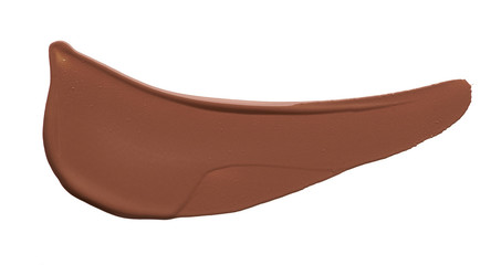 Light beige makeup smear of creamy foundation