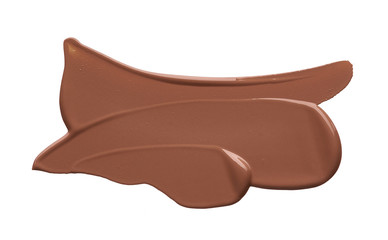 Light beige makeup smear of creamy foundation