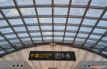 inside of the airport and roof bar with sign 