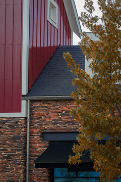 Autumn image of stone and wooden facades in Batavia, Lelystad, Netherlands