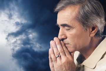 Thoughtful senior man at home
